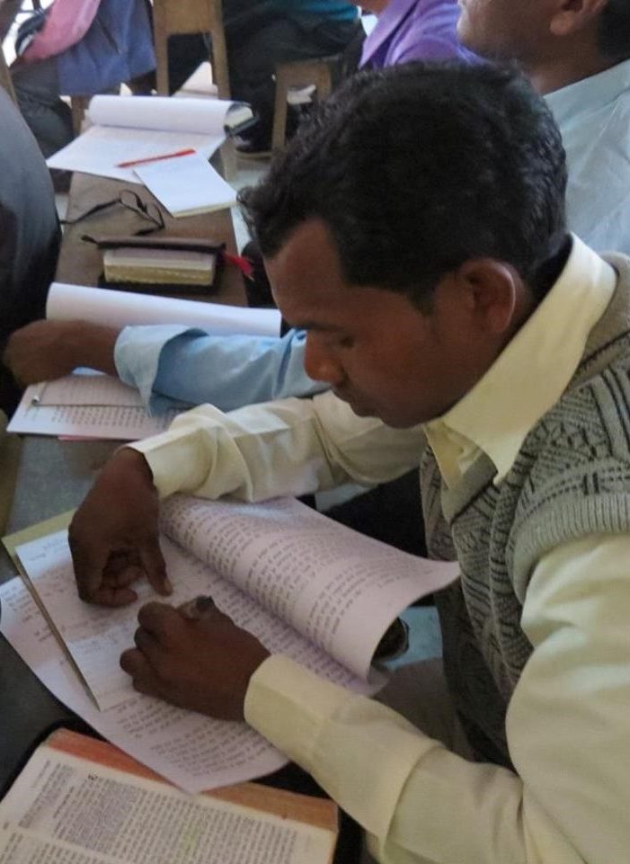 pastor-with-notebook-cropped